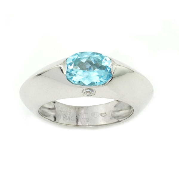 Vintage Piaget Blue Topaz and 18ct White Gold Ring; 1ct oval blue topaz accented with a small diamond on the side, in original Piaget box. Made in Switzerland Circa 1998