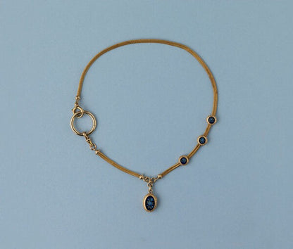 Antique Victorian Forget-Me-Not and 18ct Yellow Gold Locket Chain Pendant Necklace; 18ct yellow gold woven watch chain with three slides and a locket with two compartments decorated with forget-me-nots on both sides. France, 19th century