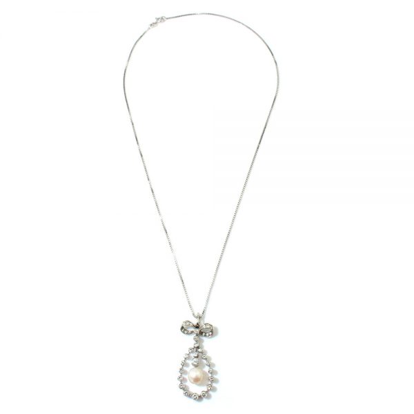 Vintage Freshwater Pearl and Diamond Pendant Necklace, 1.50 carat total, in 18ct white gold, Circa 1950s, on later 14ct gold chain