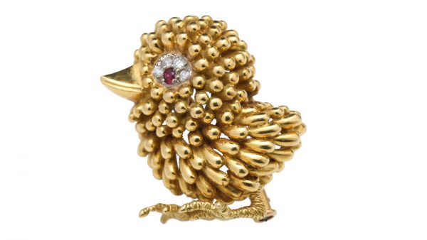 Vintage French 18ct Yellow Gold Bird Brooch; unique textured feather design, set with ruby and diamonds for the eye. Circa 1940s-1950s