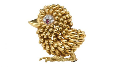 Vintage French 18ct Yellow Gold Bird Brooch; unique textured feather design, set with ruby and diamonds for the eye. Circa 1940s-1950s