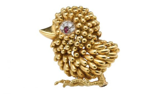 Vintage French 18ct Yellow Gold Bird Brooch; unique textured feather design, set with ruby and diamonds for the eye. Circa 1940s-1950s