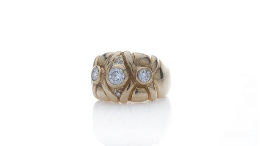 Vintage French Three Stone Diamond Ring in 18ct Yellow Gold; high end designer style, 0.73 carat total, Hallmarked with eagles head, Circa 1970s