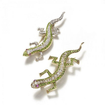 Pair of Antique Salamander Lizard Brooches; set with demantoid garnets, old-cut diamonds, and cabochon rubies, in 14ct yellow gold, c.1925