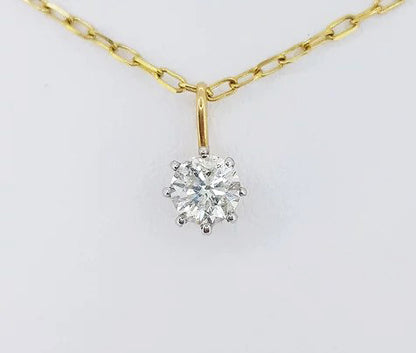 0.75ct Diamond Solitaire Pendant, single 0.75 carat round brilliant-cut diamond, claw set and suspended on a chain, in 18ct yellow gold.