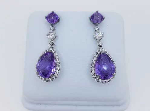 Amethyst and Diamond Pear Shaped Cluster Drop Earrings; pear-shaped rose-cut amethyst and diamond cluster suspended by an amethyst stud, via a brilliant cut diamond. Mounted in 18ct white gold.