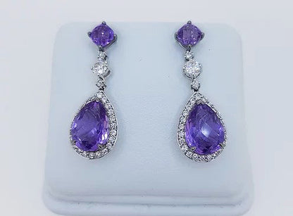 Amethyst and Diamond Pear Shaped Cluster Drop Earrings; pear-shaped rose-cut amethyst and diamond cluster suspended by an amethyst stud, via a brilliant cut diamond. Mounted in 18ct white gold.