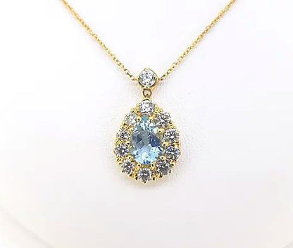Aquamarine and Diamond Pear Shaped Cluster Pendant; pear-cut 1.65 carat aquamarine surrounded by 1.20cts brilliant diamonds, diamond bale, 18ct yellow gold