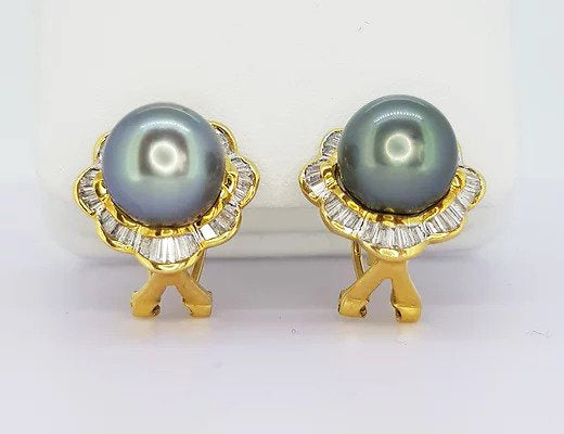 Tahitian Pearl and Diamond Cluster Earrings; Tahitian pearl set within a border of tapered baguette-cut diamonds, clip and post fittings, 18ct yellow gold.