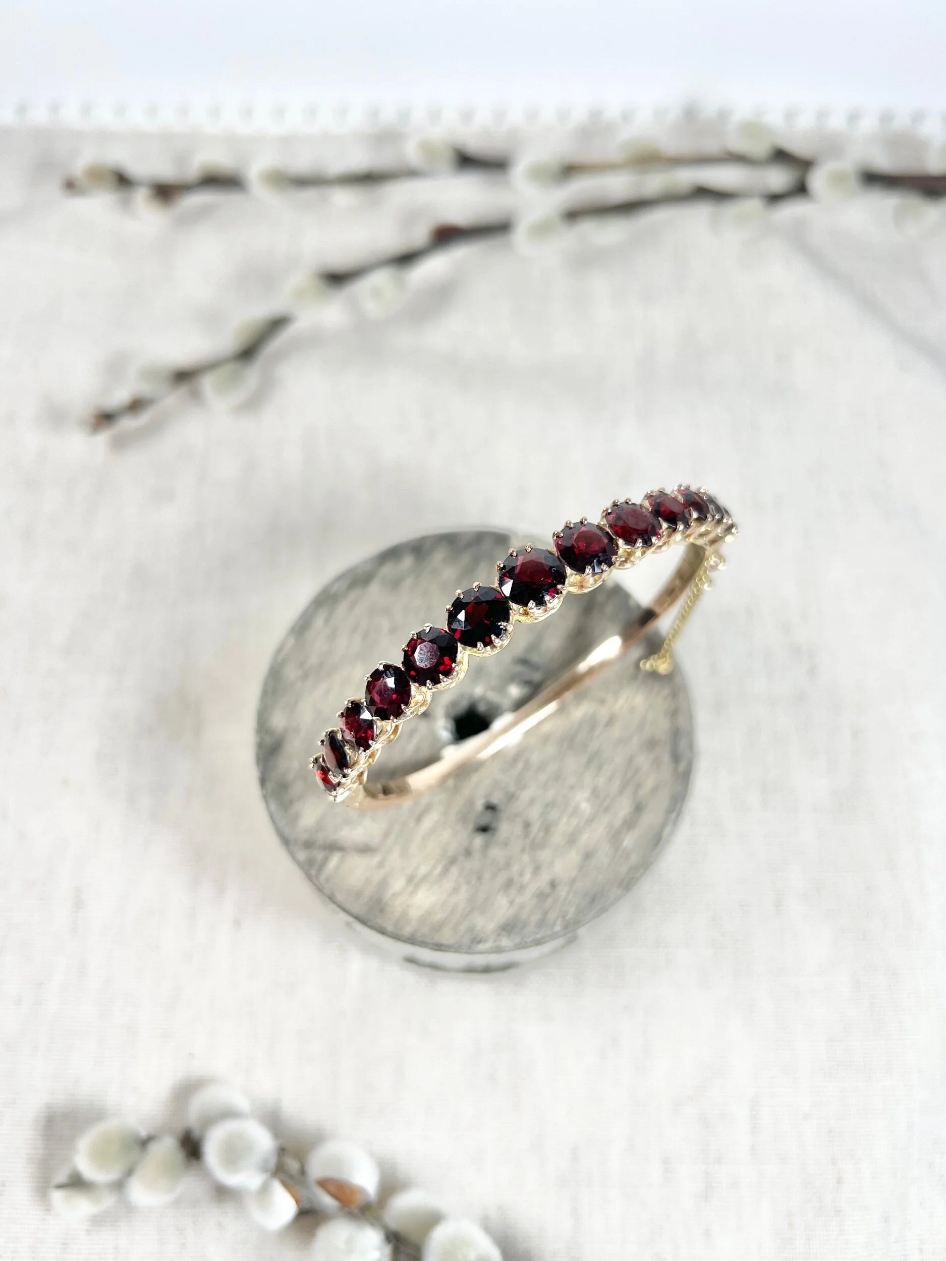 Antique Edwardian 14 Carat Gold Faceted Garnet Bangle Bracelet, Circa 1900