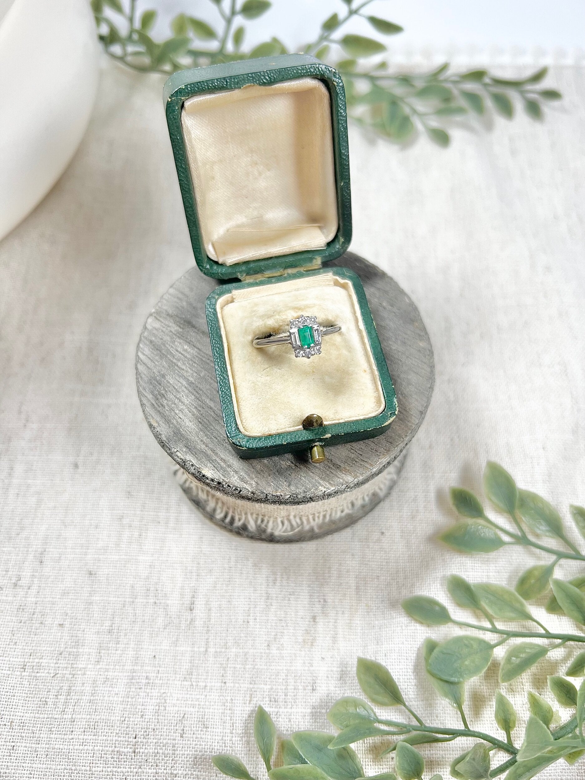 Vintage 18 Carat White Gold Emerald Cut Emerald and Diamond Cluster Ring, Circa 1940