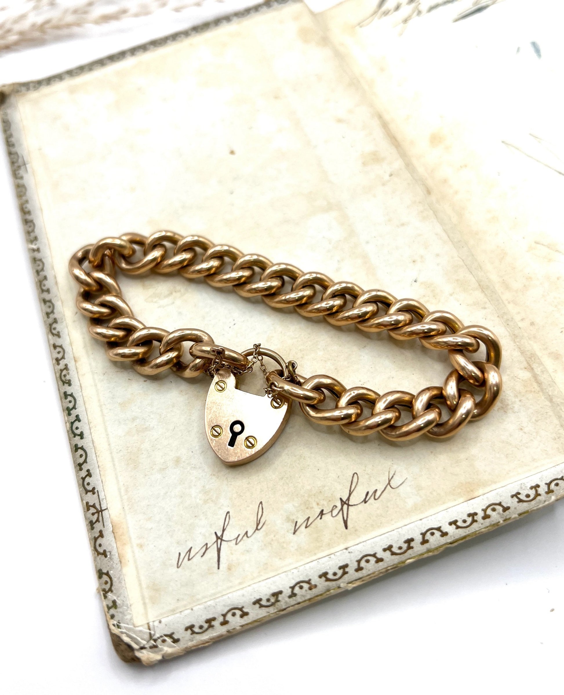 Victorian 15 Carat Rose Gold Curb Link Bracelet with Heart Padlock Clasp, Circa 1880