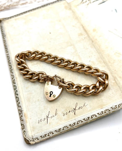 Victorian 15 Carat Rose Gold Curb Link Bracelet with Heart Padlock Clasp, Circa 1880