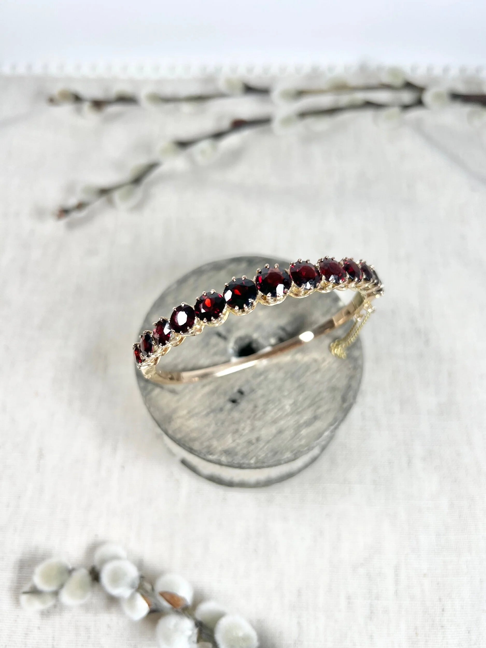 Antique Edwardian 14 Carat Gold Faceted Garnet Bangle Bracelet, Circa 1900