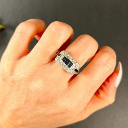 A sapphire and diamond cocktail ring in platinum, modelled on a hand