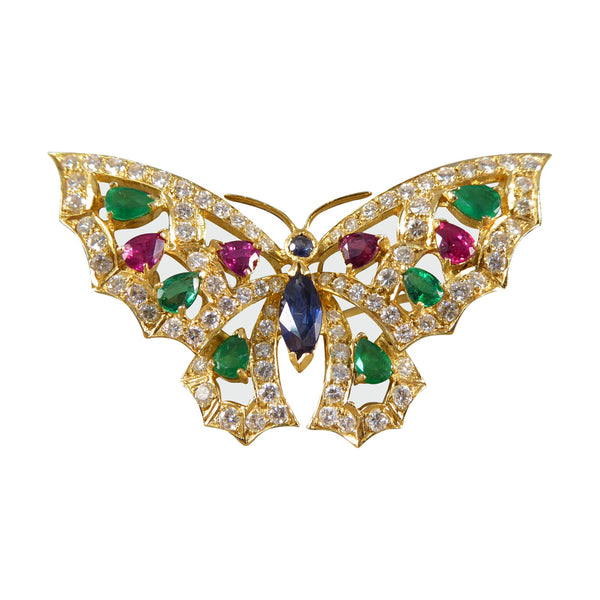Contemporary diamond emerald ruby and sapphire butterfly brooch in 18ct gold