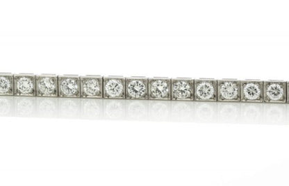 Cartier Vintage Diamond and Platinum Tennis Bracelet, 5.25 carat total, with Cartier box. Circa 1950s