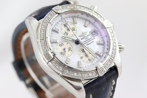Breitling Chronomat Evolution Diamond 44mm Stainless Steel Automatic, A13356, white mother of pearl dial, factory set diamond hour markers and bezel, blue Breitling crocodile leather strap with Breitling buckle, With Breitling box and papers