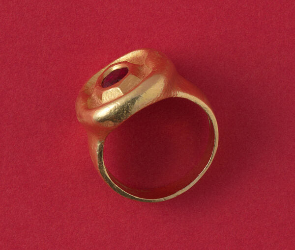 Art Deco Hammered Gold Ring with Ruby; hammered gold anthroposophical ring set with a 1.40ct oval natural untreated bright red Cambodian ruby, from the Steiner workshops during Karl Mohr’s supervision