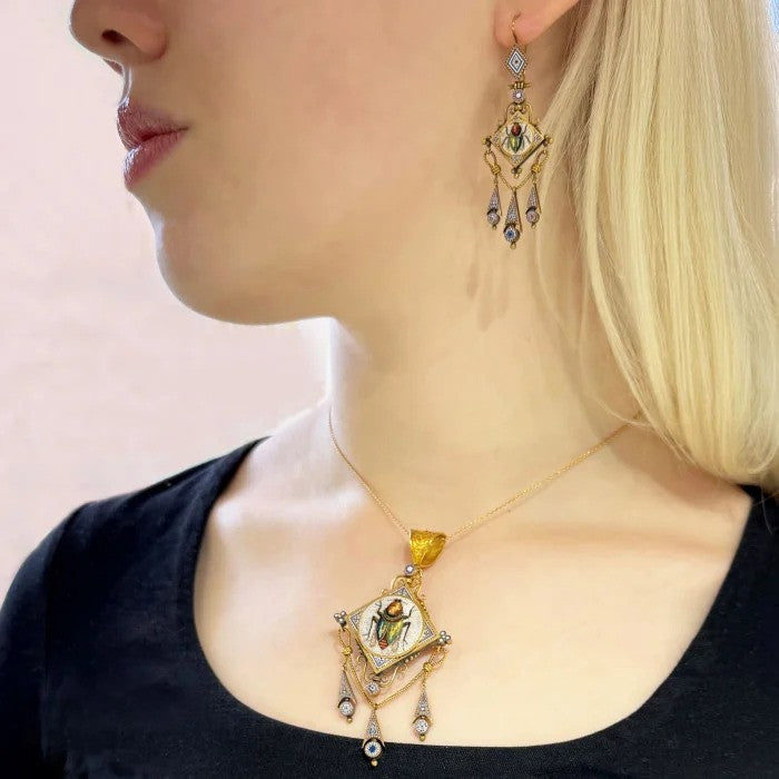 Antique Italian Micromosaic and Gold Pendant Brooch Earrings Suite, decorated with micromosaic fly beetle on blue red and white background in yellow gold with granulated Etruscan style work. Circa 1870. Comes in a Marchesini, Firenze Roma, fitted case