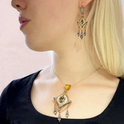 Antique Italian Micromosaic and Gold Pendant Brooch Earrings Suite, decorated with micromosaic fly beetle on blue red and white background in yellow gold with granulated Etruscan style work. Circa 1870. Comes in a Marchesini, Firenze Roma, fitted case