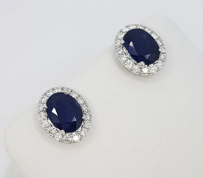 Sapphire and Diamond Oval Cluster Stud Earrings; 2.97cts oval faceted sapphires with brilliant cut diamond surround, 18ct white gold.