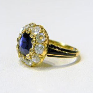 Antique Victorian 1ct Sapphire and Old Cut Diamond Cluster Ring with Enamel Shoulders in 18ct yellow gold. English, Circa 1850