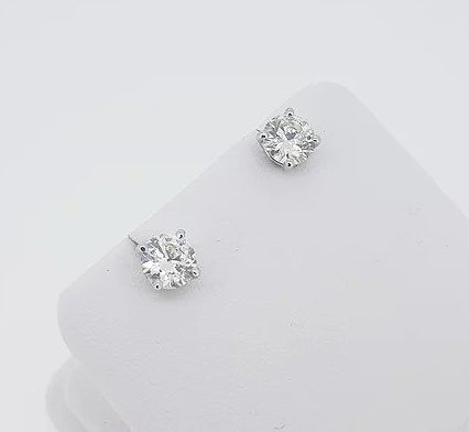 1.45ct Diamond Single Stone Stud Earrings; brilliant-cut diamonds, 1.45 carat total, four-claw set, 18ct white gold, H colour, SI1 clarity