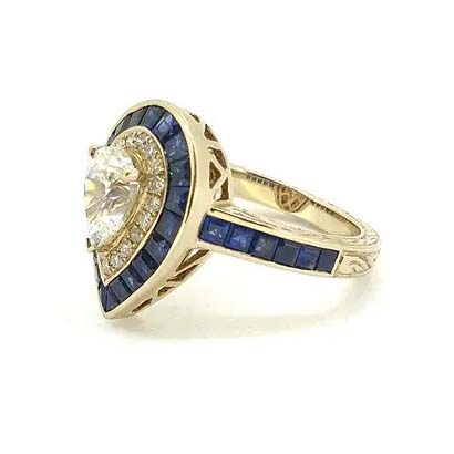 1ct Pear Cut Diamond and Sapphire Target Cluster Engagement Ring