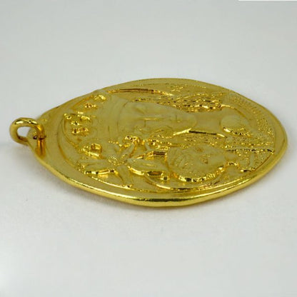 Virgin of the Lilies 18ct Yellow Gold Pendant; designed as a medal depicting the Madonna and Child with lilies, with cross on reverse