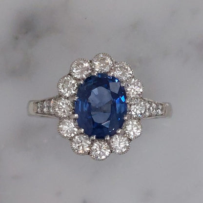 2.65ct Oval Sapphire and Diamond Cluster Ring