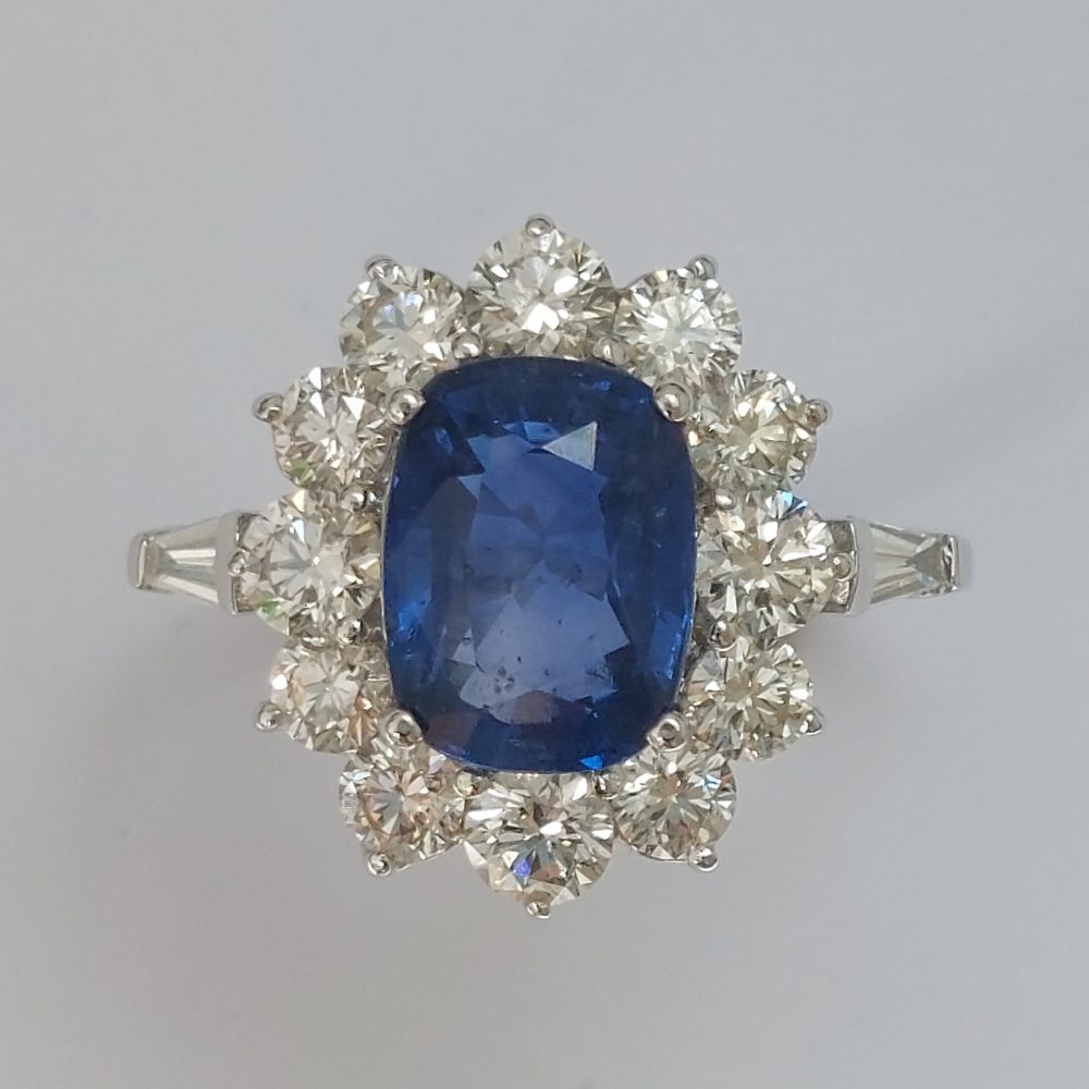 2.75ct Oval Sapphire and Diamond Cluster Ring