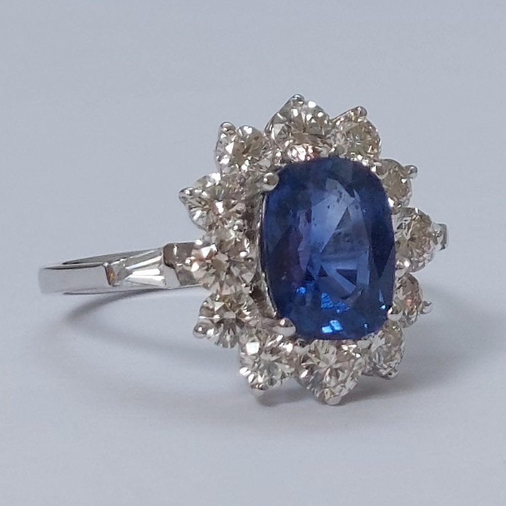 2.75ct Oval Sapphire and Diamond Cluster Ring