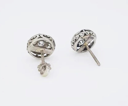 A pair of vintage Diamond Floral Cluster Stud Earrings, 1.80 carat total, mounted in platinum, pierced mount, screw back butterfly fittings