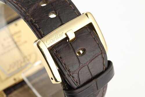 Cartier Tank Divan 18ct Yellow Gold Rectangular Quartz Watch, Large Model Ref. 2602, white dial, Roman numerals, blued steel hands, sapphire crystal, sapphire crown, Cartier brown leather strap with 18ct yellow gold pin buckle.