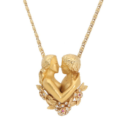 Ruby and diamond necklace in yellow gold.