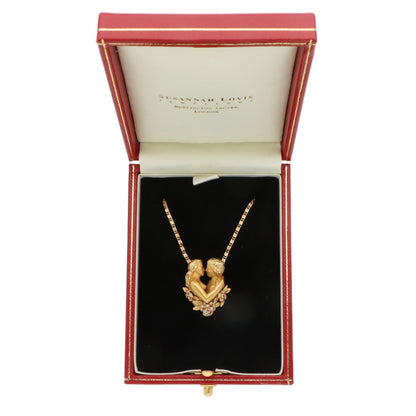 Ruby and diamond necklace in yellow gold.