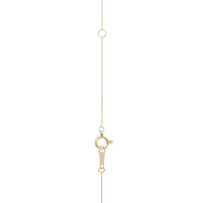 Diamond seahorse pendant necklace in gold.
