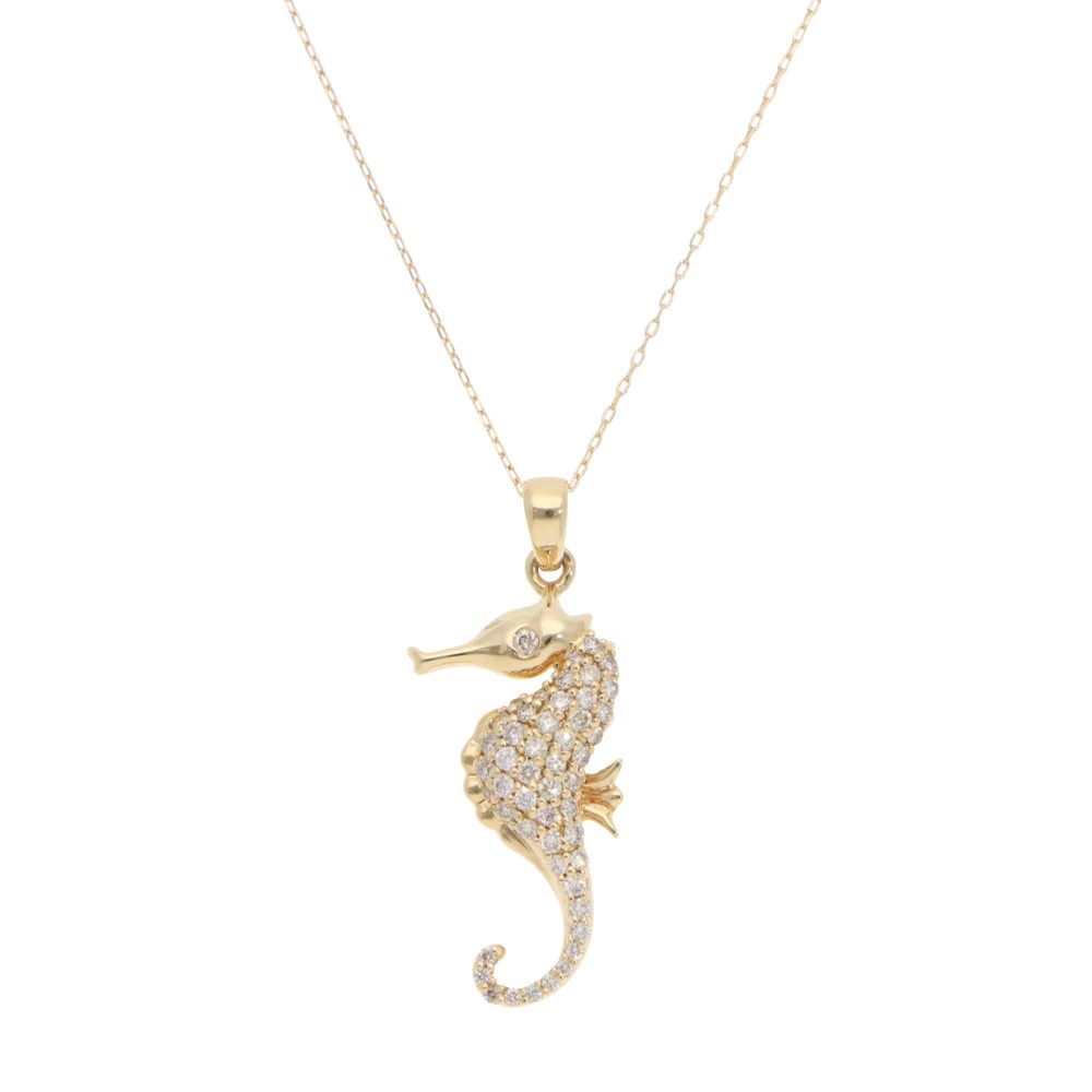 Diamond seahorse pendant necklace in gold.