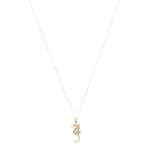 Diamond seahorse pendant necklace in gold.