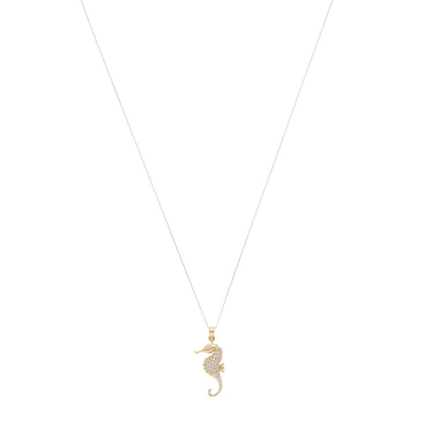Diamond seahorse pendant necklace in gold.