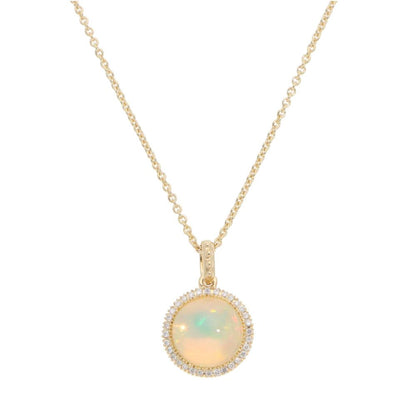 Opal and diamond pendant necklace in gold.