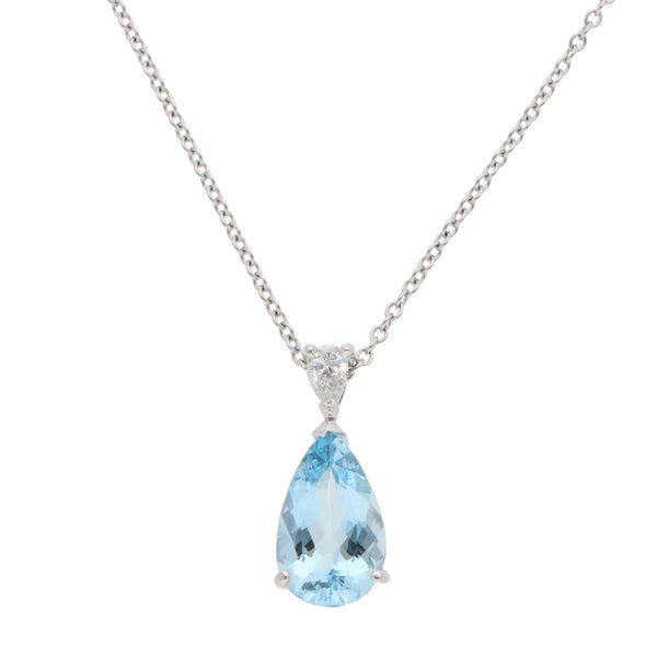 A pear shaped aquamarine and diamond pendant on a white gold chain, on a white background