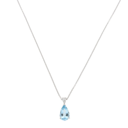 A pear shaped aquamarine and diamond pendant on a white gold chain, on a white background