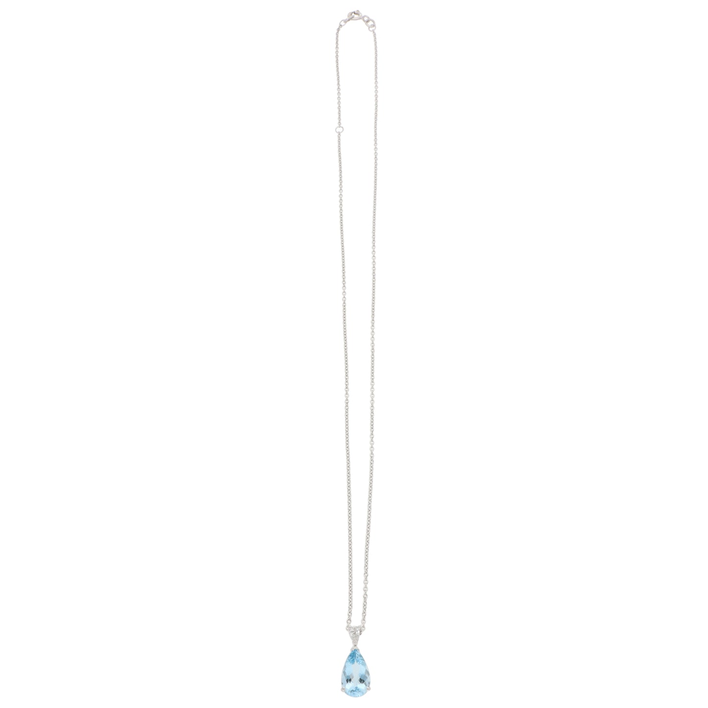 A pear shaped aquamarine and diamond pendant on a white gold chain, on a white background