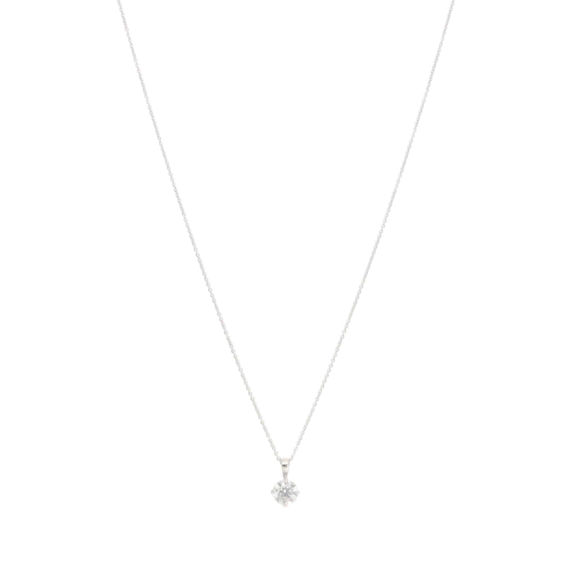 Diamond solitaire pendant necklace in white gold.