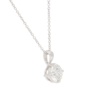 Diamond solitaire pendant necklace in white gold.