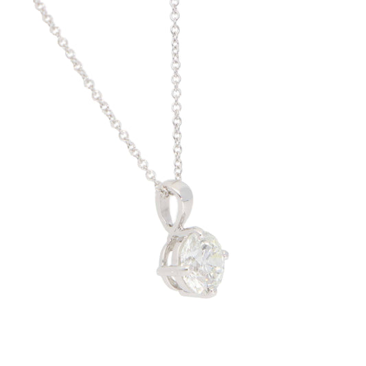 Diamond solitaire pendant necklace in white gold.