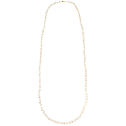 Akoya pearl necklace with a gold barrel clasp.