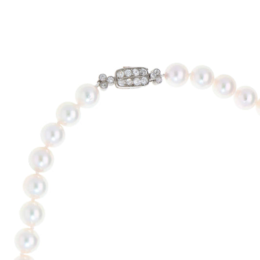Akoya pearl necklace with a vintage Art Deco diamond clasp.